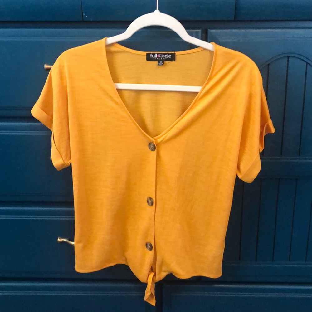 Mustard yellow waist high blouse.